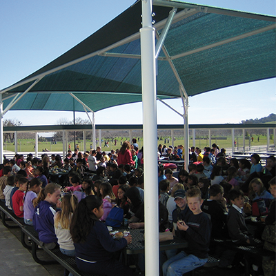 Shade structures like canopies, in public environments, providing shade and UV protection.